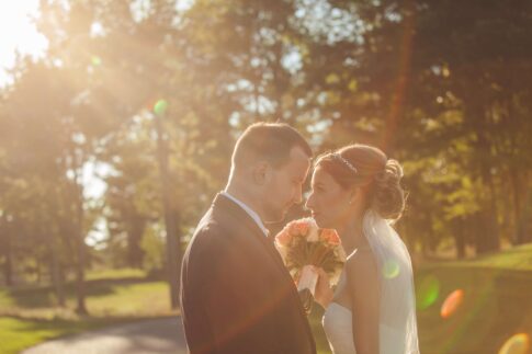 romantic sunflare bride and groom wedding photo solitude links golf course michgan