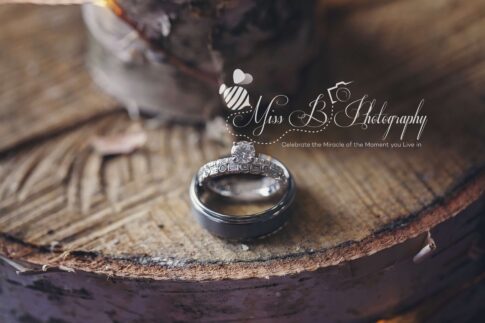 wedding rings on wood rustic wedding detail decor michigan wedding