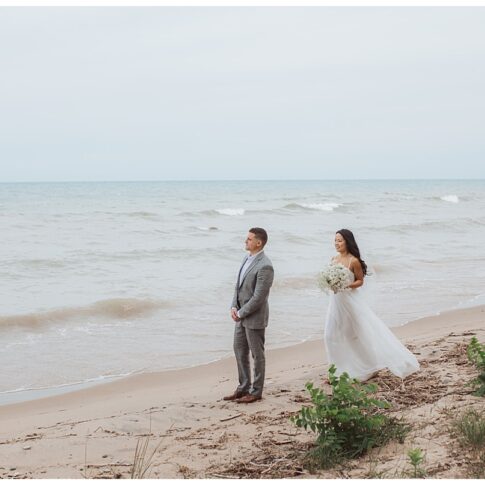 first look, Lexington beachfront wedding, Michigan wedding photographer, Port Huron Wedding on beach bride and groom
